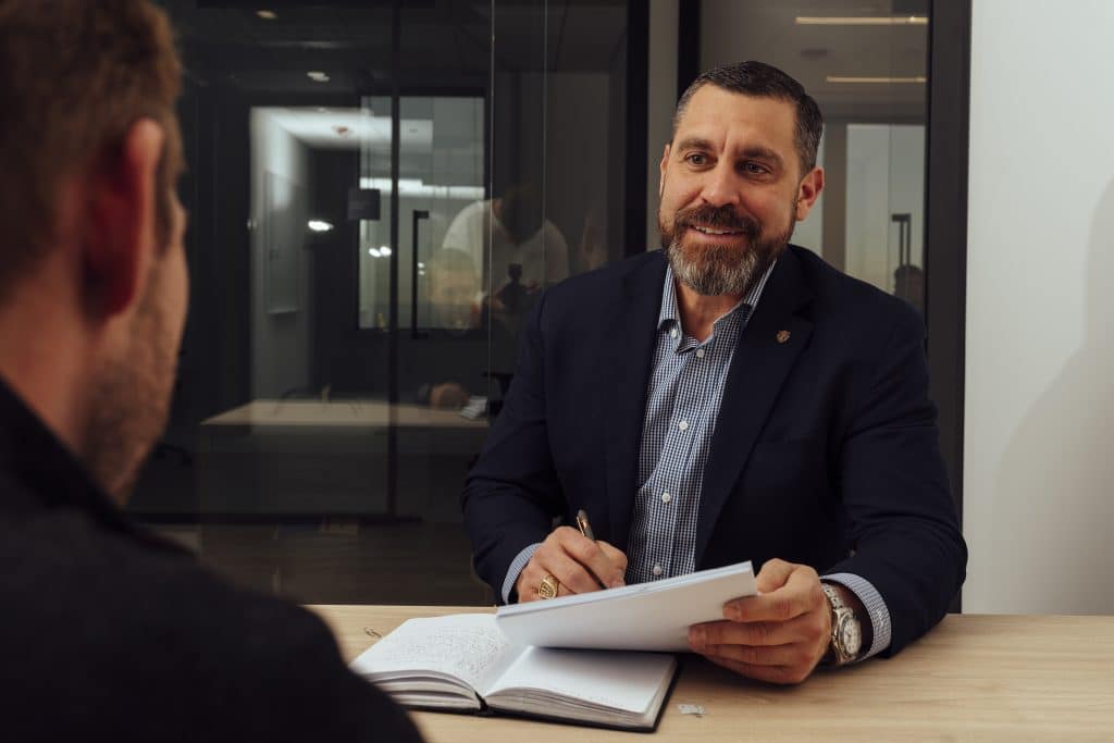 two men meeting in their office